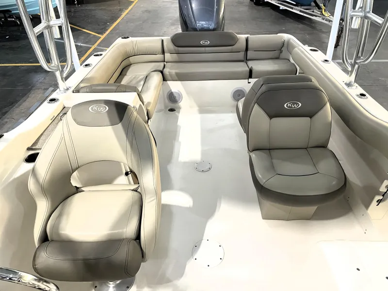 Slide: The Image of 2023 Key West 239 DFS boat interior with cushioned seating and modern design. - 22