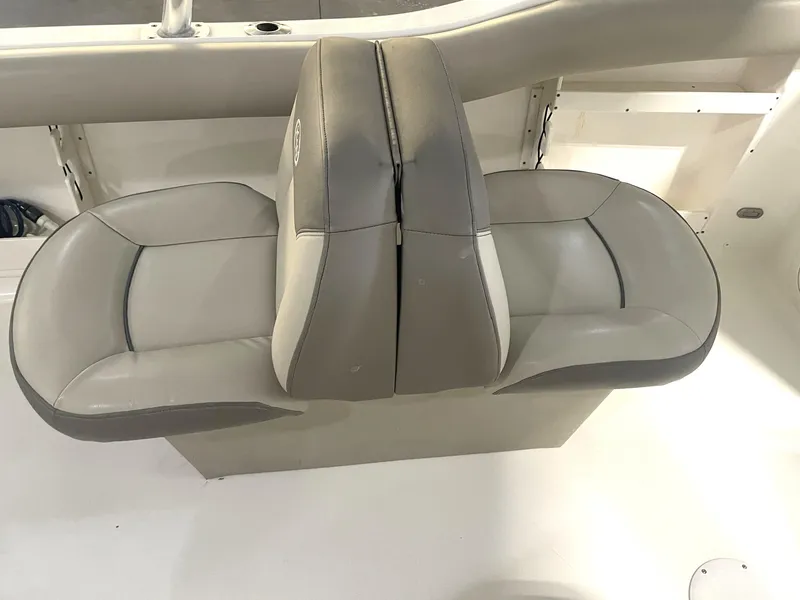 Slide: The Image of 2023 Key West 239 DFS boat seating, featuring dual-tone cushioned seats. - 31