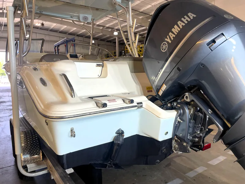 Slide: The Image of 2023 Key West 239 DFS boat on trailer in indoor showroom. - 4