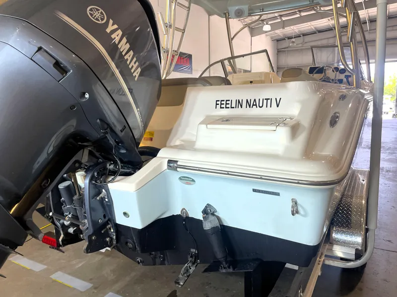 Slide: The Image of 2023 Key West 239 DFS boat on trailer in indoor showroom. - 5