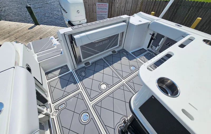 Slide: The Image of 2021 Blackfin 252 CC boat deck with sleek, modern design and spacious layout. - 9
