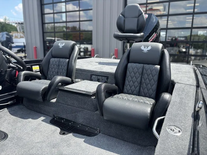 Slide: The Image of 2026 Phoenix 721 ZXL boat interior with luxurious black leather seats. - 10