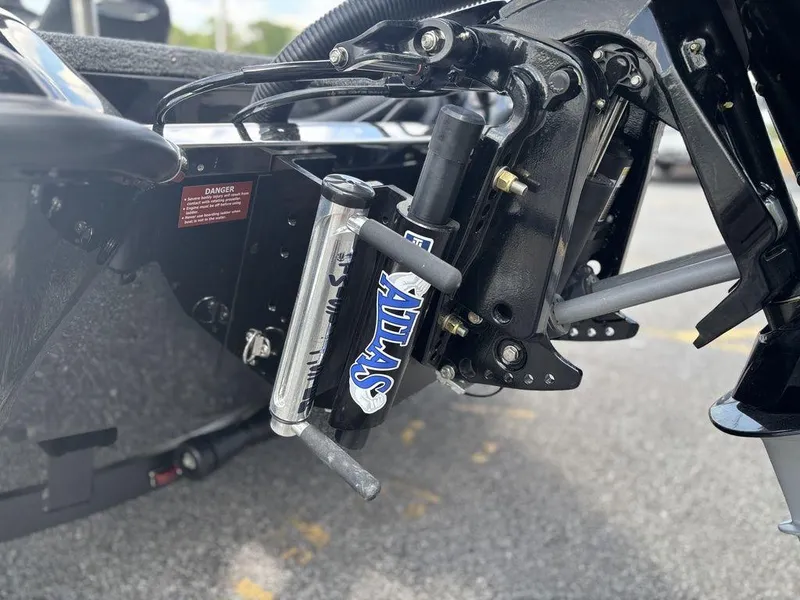 Slide: The Image of Close-up of a 2026 Phoenix 721 ZXL boat's hydraulic steering mechanism. - 19