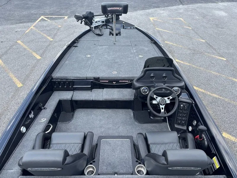 Slide: The Image of 2026 Phoenix 721 ZXL boat interior with steering wheel, seats, and control panel. - 21