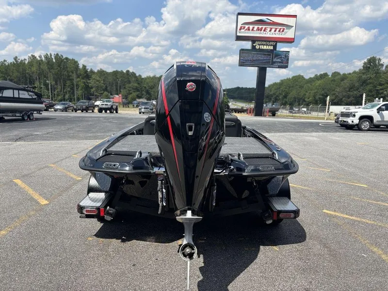Slide: The Image of 2026 Phoenix 721 ZXL boat with powerful outboard motor at dealership parking lot. - 5