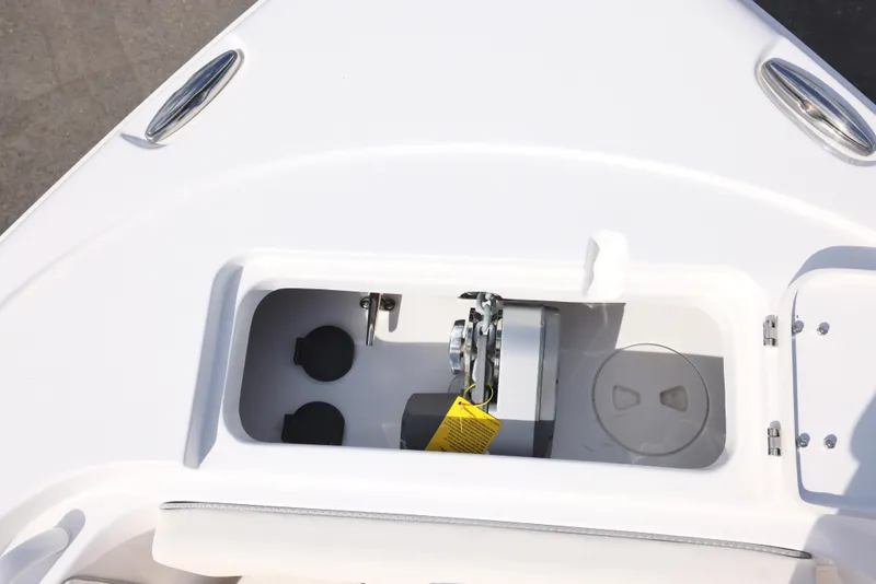 Slide: The Image of 2025 Sea Hunt Ultra 245 SE boat anchor compartment detail. - 11