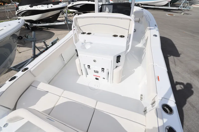 Slide: The Image of 2025 Sea Hunt Ultra 245 SE boat interior with seating and storage compartments. - 6