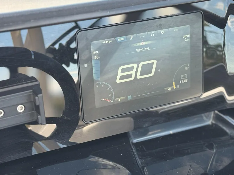 Slide: The Image of Dashboard display of 2022 Yamaha Boats AR 195 S showing 80°F water temperature. - 26
