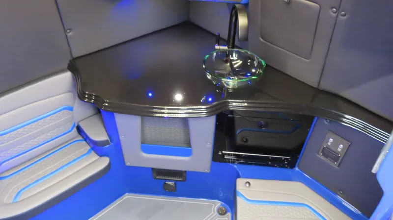 Slide: The Image of Luxurious interior of 2025 MTI 42V with sleek seating and modern sink design. - 16