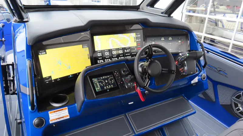 Slide: The Image of Control panel of 2025 MTI 42V boat with advanced navigation displays and steering wheel. - 20
