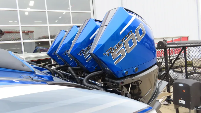 Slide: The Image of Triple blue Racing 500 outboard motors on MTI 42V boat, 2025 model. - 4
