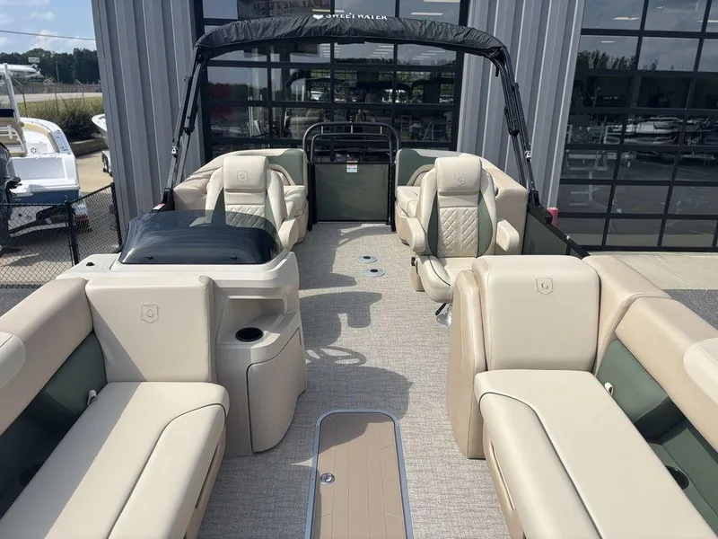 Slide: The Image of 2026 Godfrey SWEETWATER 2286 SB pontoon boat interior with beige seating and modern design. - 10