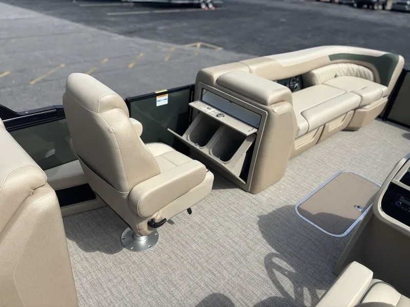Slide: The Image of Luxurious interior of 2026 Godfrey SWEETWATER 2286 SB pontoon boat with beige seating. - 12