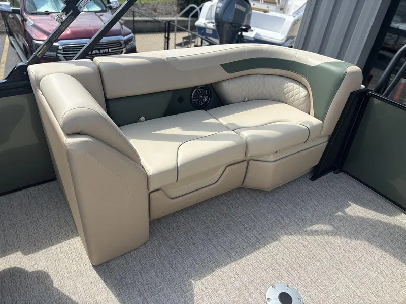 Slide: The Image of Luxurious seating on 2026 Godfrey SWEETWATER 2286 SB pontoon boat, featuring beige upholstery. - 18