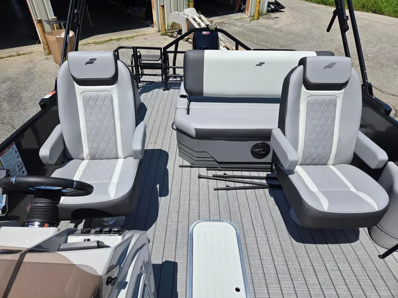 Slide: The Image of 2026 Starcraft EXS1QDH boat interior with gray seating and modern design. - 5