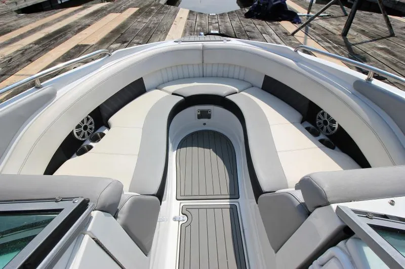 Slide: The Image of 2015 Cruisers Sport Series 238 Bow Rider interior with spacious seating and modern design. - 23