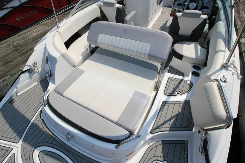 Slide: The Image of 2015 Cruisers Sport Series 238 Bow Rider interior with seating and deck details. - 9