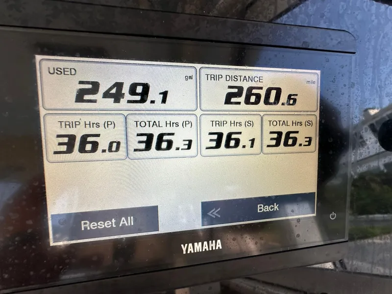 Slide: The Image of Display screen showing fuel usage and trip data for 2024 Grady-White Freedom 335 boat. - 31