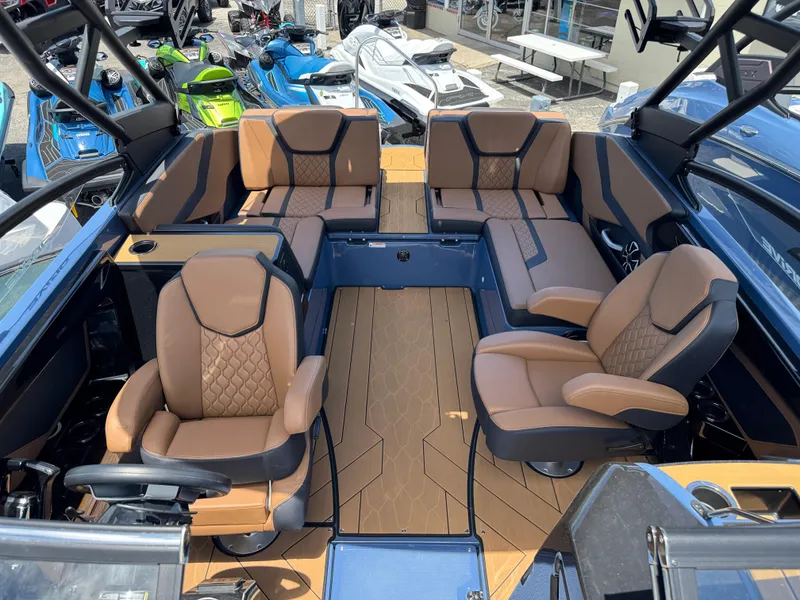 Slide: The Image of 2024 Yamaha Boats 255XD interior with luxurious seating and modern design. - 16
