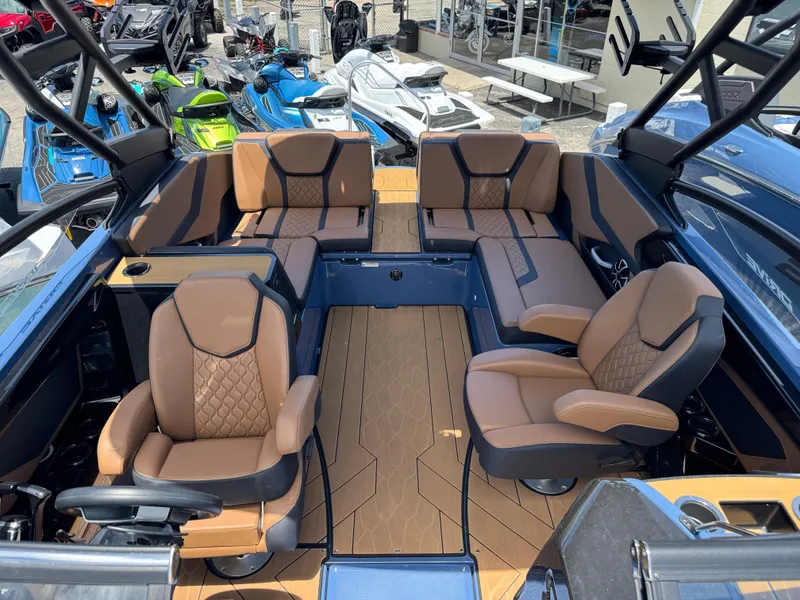 Slide: The Image of 2024 Yamaha Boats 255XD interior with luxurious seating and modern design. - 17