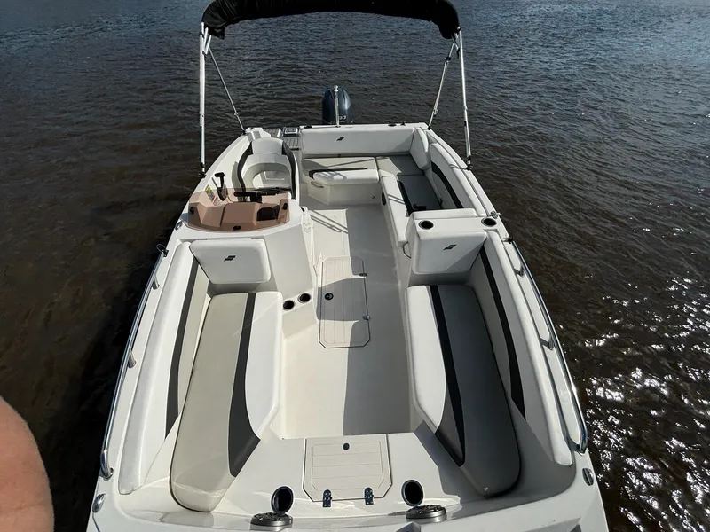 Slide: The Image of 2021 Starcraft SVX 171 OB boat with spacious seating on calm water. - 6