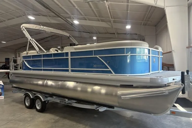 Slide: The Image of 2025 Godfrey Xperience 2286 SBX pontoon boat with iMPACT Center Tube Package in showroom. - 4
