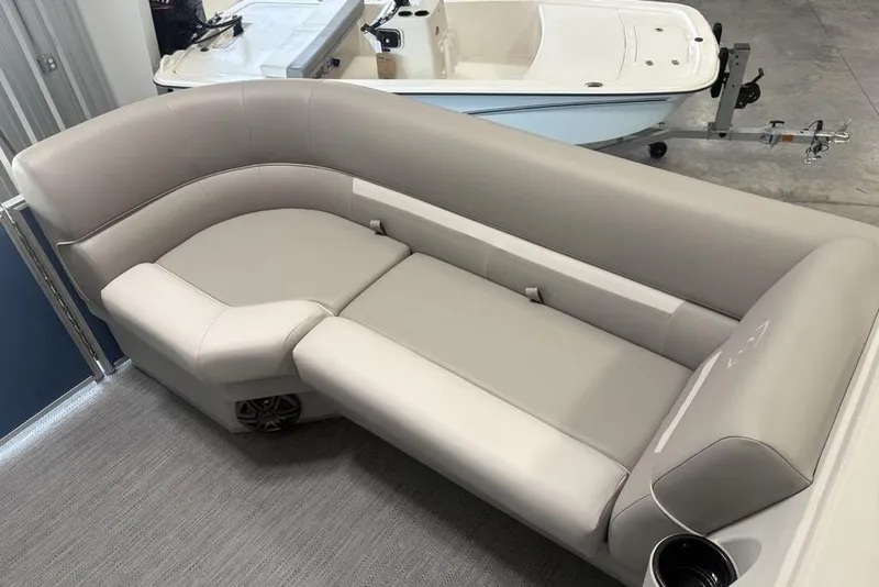 Slide: The Image of Luxurious seating on 2025 Godfrey Xperience 2286 SBX pontoon boat, featuring iMPACT Center Tube Package. - 8