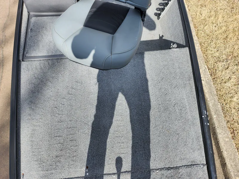 Slide: The Image of 2021 Tracker Bass Tracker Classic XL boat interior with gray seat and carpet. - 16