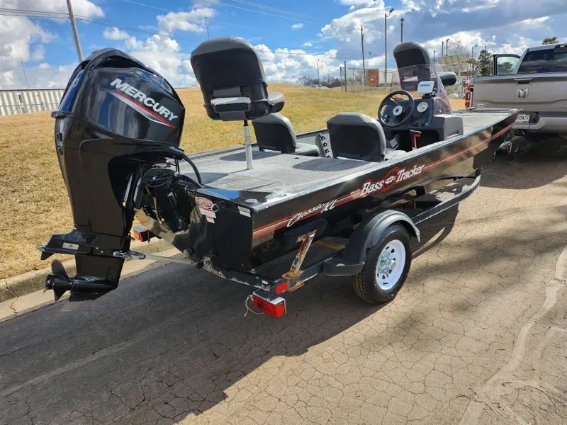 Slide: The Image of 2021 Tracker Bass Tracker Classic XL boat with Mercury engine on trailer. - 3