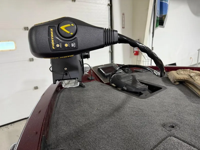 Slide: The Image of Minn Kota Fortrex trolling motor on a 2014 Ranger 118c boat deck. - 8