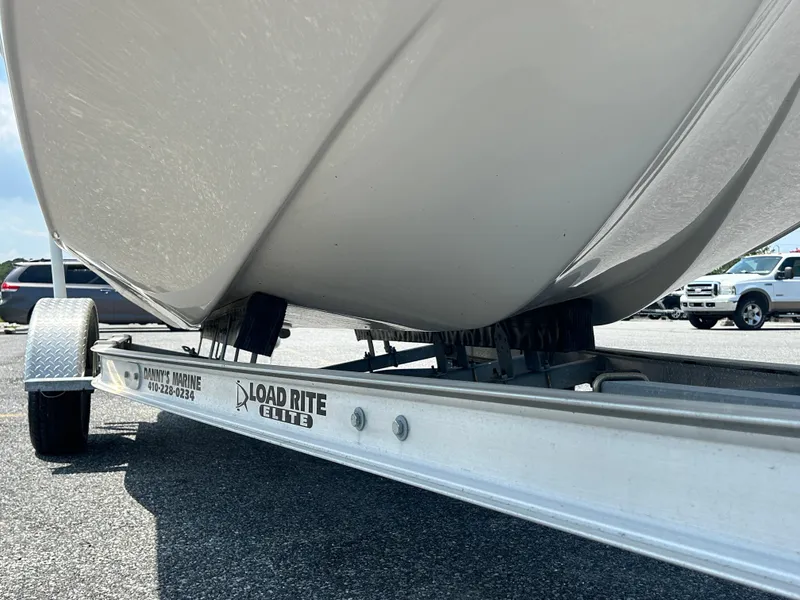 Slide: The Image of 2022 Carolina Skiff 19 LS boat on Load Rite Elite trailer in parking lot. - 4