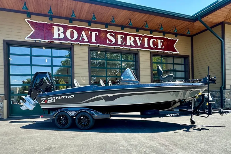 The Image of 2025 Nitro ZV21 Pro boat parked outside a boat service center. - 0
