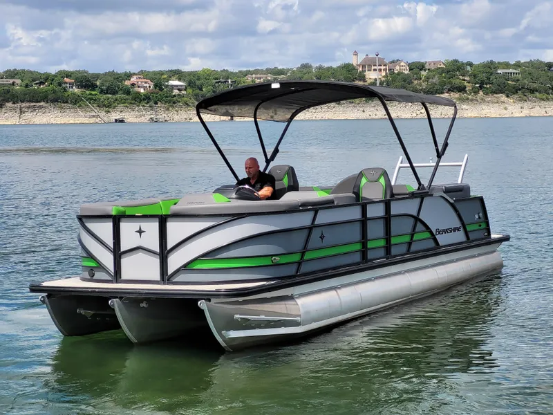 Slide: The Image of 2023 Berkshire 25RFX STS 3.0+ pontoon boat on a scenic lake. - 5