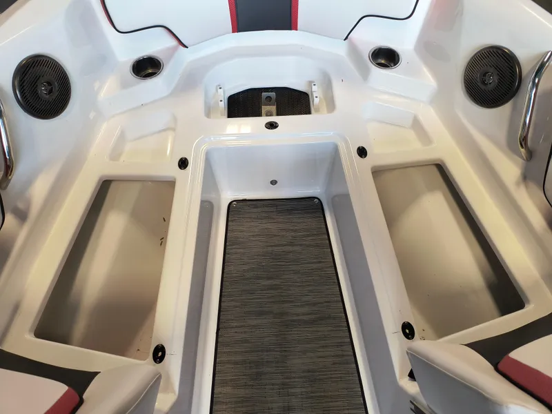 Slide: The Image of Interior of 2023 Scarab 195 ID boat with seating and storage compartments. - 28