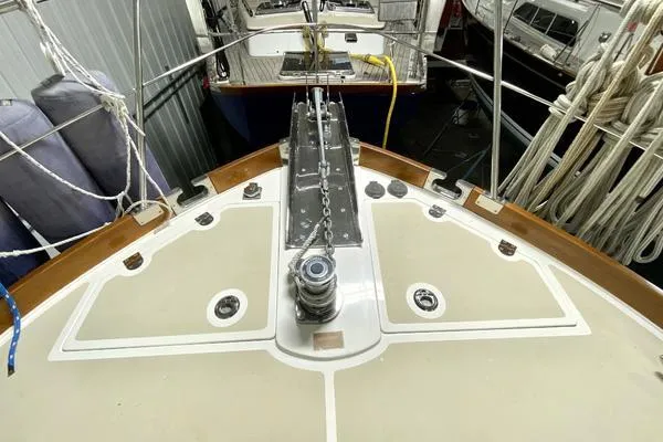 Slide: The Image of 2011 Grand Banks 46 Eastbay SX cruising on open water under a clear sky. - 11