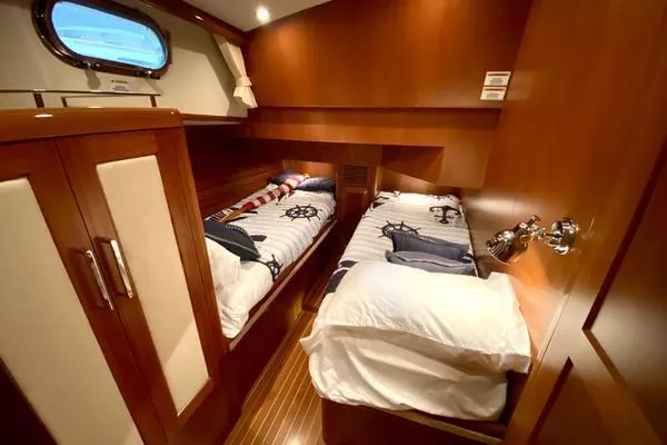 Slide: The Image of 2011 Grand Banks 46 Eastbay SX yacht with spacious deck and scenic waterfront view. - 30