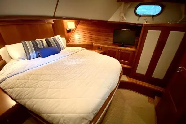 Slide: The Image of Bow view of 2011 Grand Banks 46 Eastbay SX yacht on water. - 36