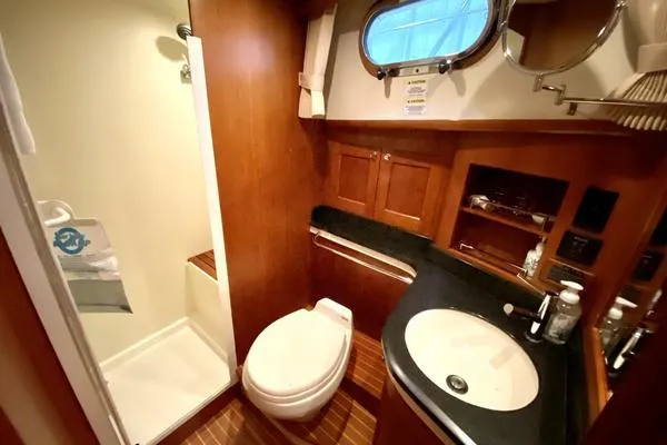 Slide: The Image of Luxurious interior of 2011 Grand Banks 46 Eastbay SX yacht with plush seating and modern amenities. - 37