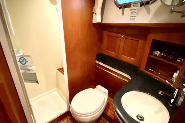 Slide: The Image of Luxurious interior of 2011 Grand Banks 46 Eastbay SX yacht with plush seating and nautical decor. - 39