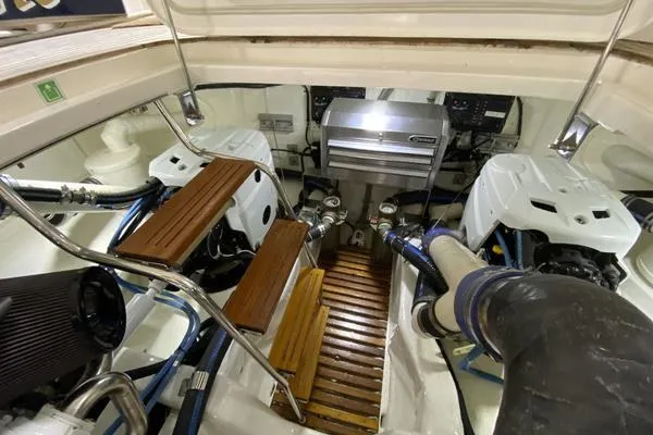 Slide: The Image of Helm of 2011 Grand Banks 46 Eastbay SX yacht with navigation screens and controls. - 45