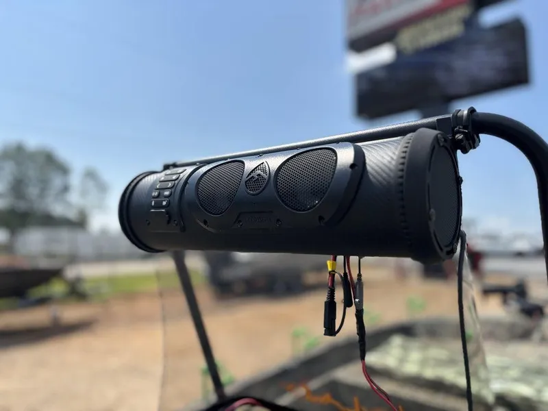 Slide: The Image of Outdoor speaker system on 2025 Tracker GRIZZLY® 1860 CC boat, sunny day background. - 15