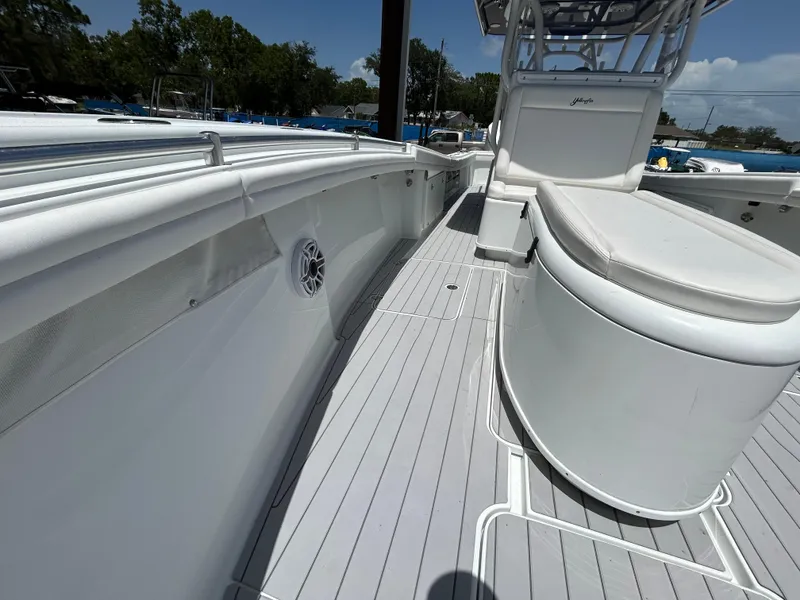 Slide: The Image of 2019 Yellowfin 36 Offshore boat deck with seating and sleek design. - 19