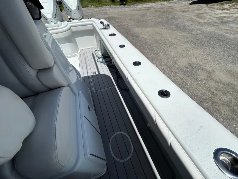 Slide: The Image of 2019 Yellowfin 36 Offshore boat interior with seating and deck details. - 22