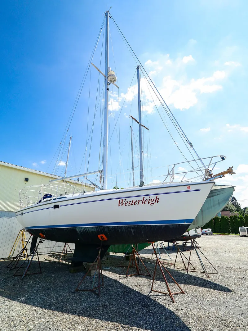 Slide: The Image of Catalina 36 MkII 2001 sailboat "Westerleigh" on stands under a clear blue sky. - 1