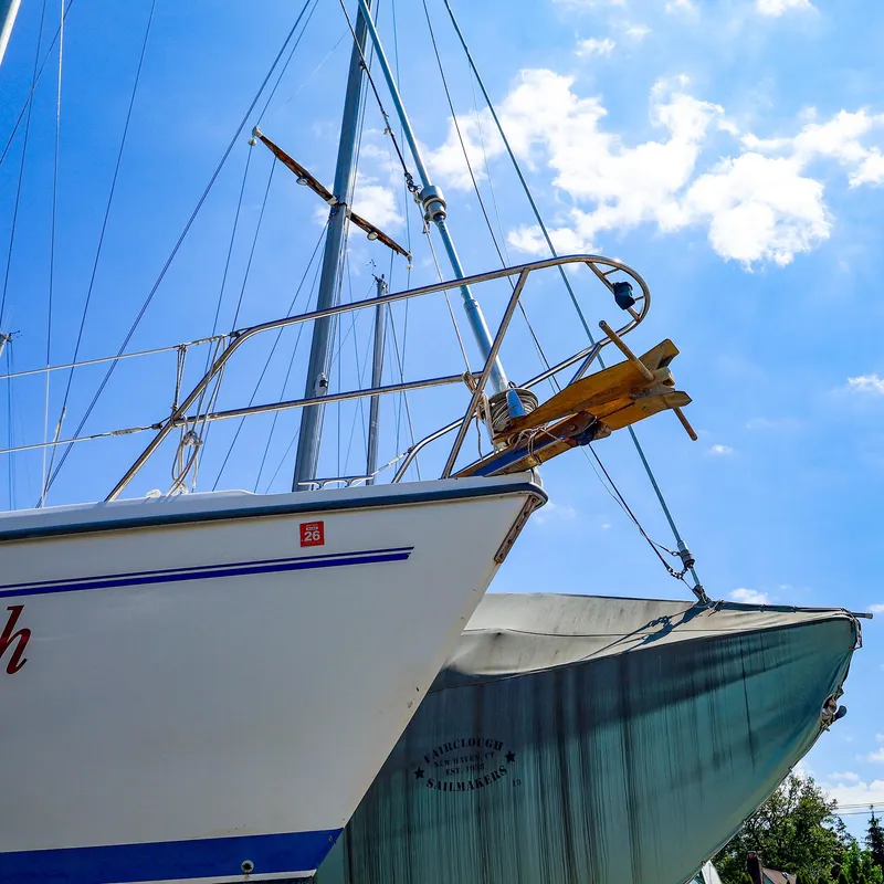 Slide: The Image of Catalina 36 MkII sailboat from 2001, docked under a bright blue sky. - 3