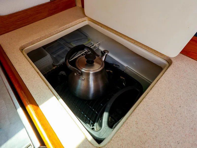 Slide: The Image of Stainless steel kettle on stove in 2001 Catalina 36 MkII yacht galley. - 35