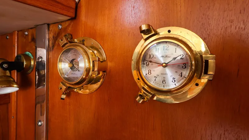 Slide: The Image of Brass clock and barometer on Catalina 36 MkII yacht's wooden interior, 2001 model. - 38