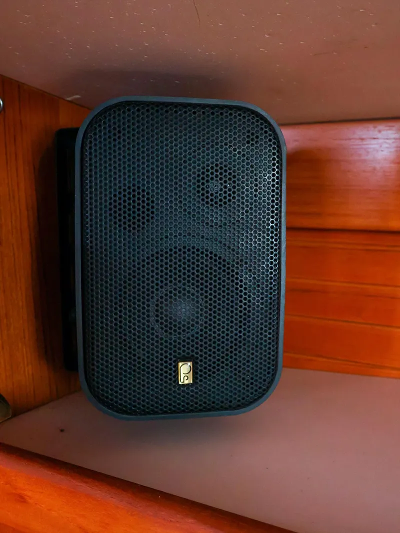 Slide: The Image of Black speaker mounted on wooden panel inside a 2001 Catalina 36 MkII boat. - 40
