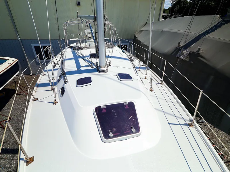 Slide: The Image of 2001 Catalina 36 MkII sailboat deck view, showcasing sleek design and rigging details. - 5