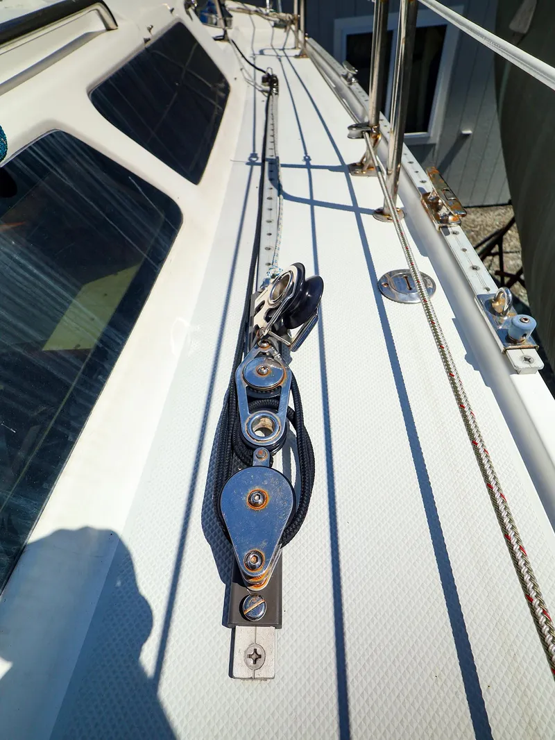 Slide: The Image of Deck of 2001 Catalina 36 MkII sailboat with rigging and pulleys. - 6